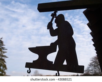 Traditional vintage blacksmith workshop sign forged in iron - Powered by Shutterstock