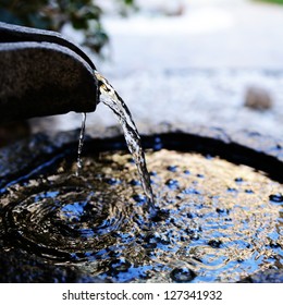 Traditional Water Fountain In Garden