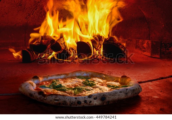 Traditional way baked wood fired oven Italian\
pizza bakery\
pizzeria