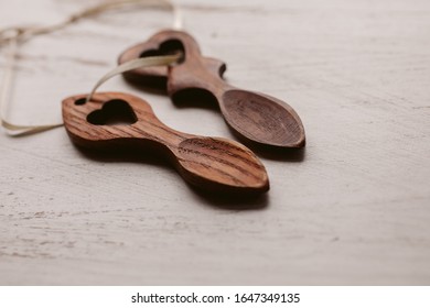 Traditional Welsh Wooden Spoons On White Background. Wooden Love Spoons From Wales. 