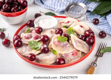 Traditional West Europe Dumplings with Cherries, ukrainian, polish vegan Cherry Pierogi, Sweet berry fruit Vareniki, ravioli with sour cream and sugar powder