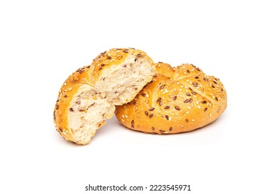 Traditional white kaiser roll with linseeds and sesame seeds isolated on white background. - Powered by Shutterstock