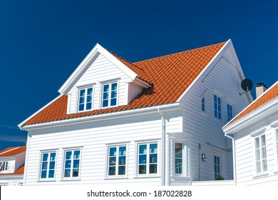 Traditional White Wooden House In Norway, Summer Day