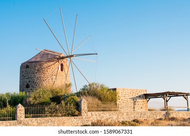 Traditional Windmill In Milos, Cyclades Islands, Aegean Sea, Greece