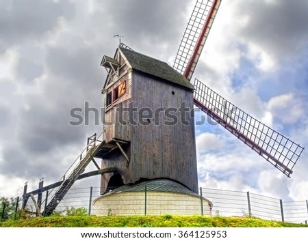 A traditional windmill near the village of Bruges, Belgium