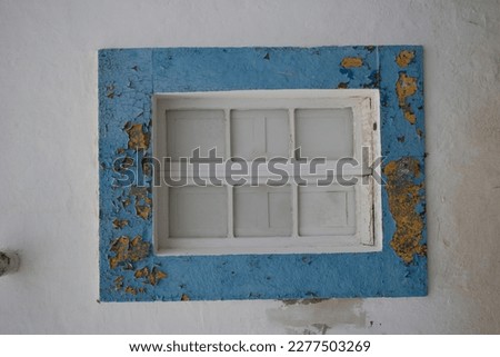 traditional window with shutters in southern Portugal
