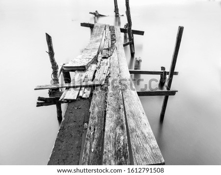 Similar – Brücke im Nebel See Steg