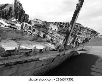 Traditional Wooden Boat. Stranded Boat On Beach.