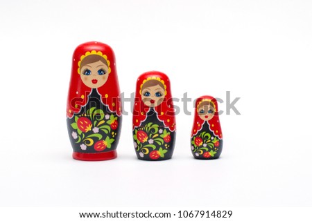 Traditional wooden doll Matreshka (Babushka) isolated on a white background