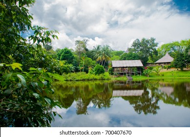 Traditional Wooden House Near The Lake In The Kuching To Sarawak Culture Village. Borneo, Malaysia