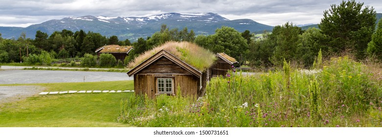 Traditional Wooden Houses With Roof Covered With Grass, Plants And Flowers In Oppdal In Norway, Scandinavia