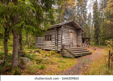 Traditional wooden wilderness hut, cabin cottage, in Oulanka national park, Lapland, Finland - Powered by Shutterstock