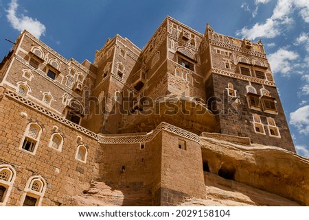  traditional Yemeni heritage architecture design details in historic Sanaa town and buildings in Yemen. Dar al-Hajar in Wadi Dhahr, a royal palace on a rock. iconic Yemeni building. Yemen Culture.