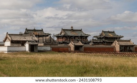 The traditionally constructed buildings of the Erdene Dsu monastery with the monastery wall in central Mongolia in Asia.
