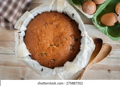 Traditionally home baked farmhouse sultana or dried fruit light sponge cake top down view