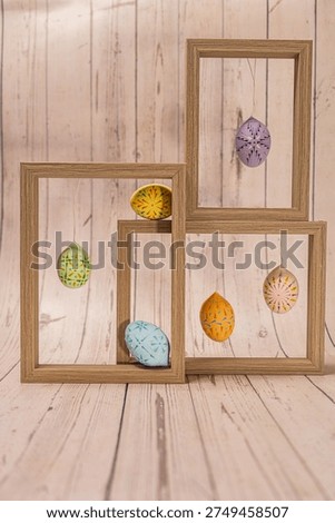 Traditionally painted Easter Eggs by Picture Frame