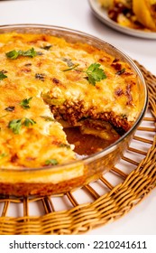 Traditionally Served Greek Moussaka With Béchamel Sauce And Layers Of Grilled Vegetables In An Oven-baked Casserole Dish With Cinnamon