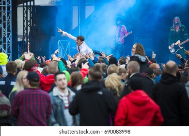 Traena, Norway - July 6 2017: Singer Of Norwegian Punk Rock Band Honningbarna Crowd Surfing At Traenafestival, Music Festival Taking Place On The Small Island Of Traena