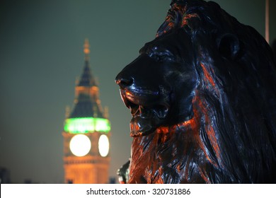 Trafalgar Square Lion Statue And Big Ben In London