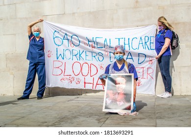 TRAFALGAR SQUARE, LONDON/ENGLAND- 12 September 2020: Protesters with a banner reading '640 Healthcare Workers Dead - Blood On Their Hands' and holding image of Matt Hancock the protest for pay justice