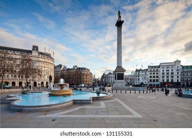 Trafalgar Square is a public space and tourist attraction in central London. Landscape shot with tilt-shift lens maintaining verticals - Shutterstock ID 131155331