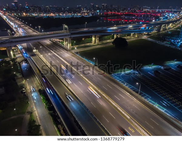 Traffic Aerial View - Traffic\
concept image, birds eye daytime view use the drone in Taipei,\
Taiwan.