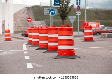 Traffic Barrier Barrels In The Parking Lot