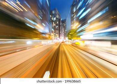 Traffic With Blur Light Through City At Night