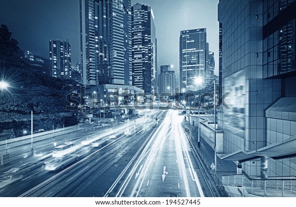 traffic with blur\
light through city at\
night