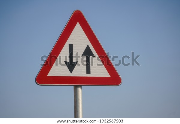 Traffic in both\
directions. Road sign.