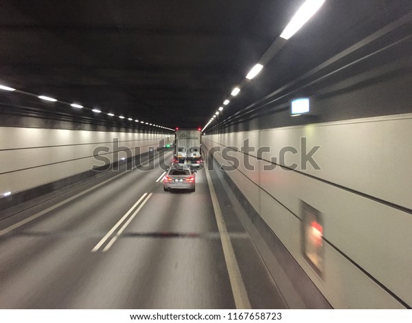 The traffic of cars in the tunnel. Copenhagen,\
Denmark. January 30, 2018
