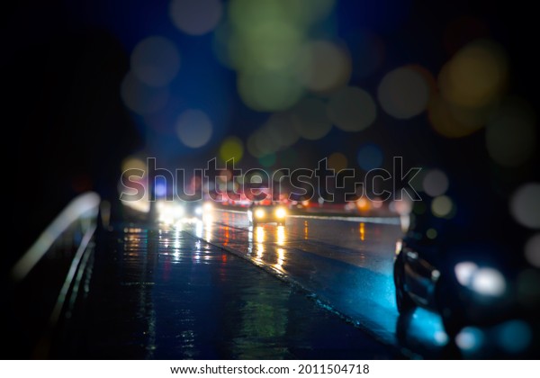traffic in the city on rainy\
night