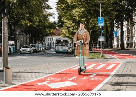 Similar – Traffic sign with electric scooter