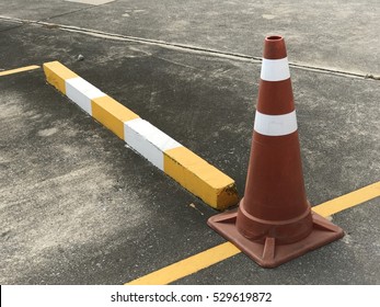 Traffic Cone And Empty Parking Car
