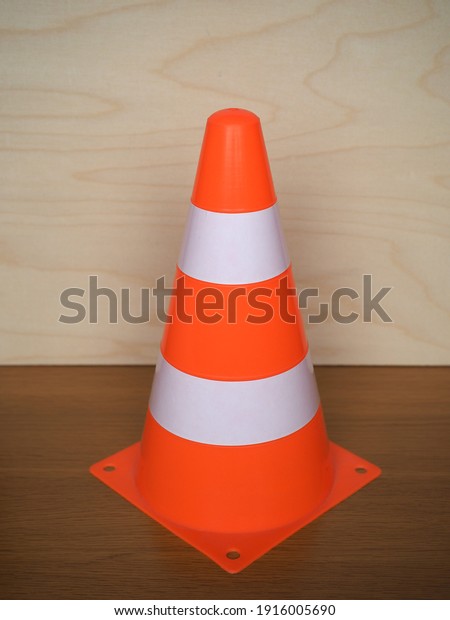 traffic\
cone to mark road works or temporary\
obstruction