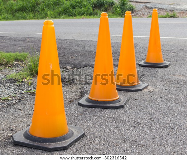 Traffic cone on the\
road