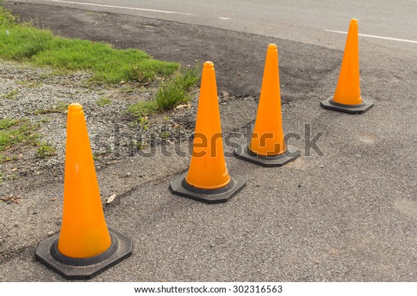 Traffic cone on the\
road