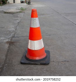 Traffic Cone On The Side Of The City Road.