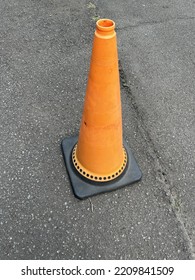 A Traffic Cone On The Side Of The Road