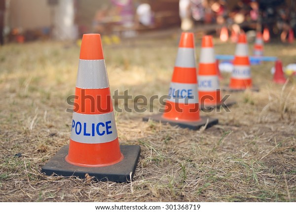 Traffic cone in the police\
area