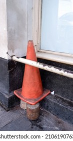 Traffic cone, is a temporary traffic control device in the form of a cone made of plastic or rubber.