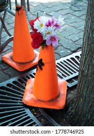 A Traffic Cone Turned Into A Vase. 