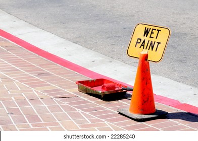 Traffic Cone And Wet Paint Sign