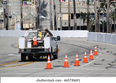 Traffic Cones Are Put Around Work Zone To Warn Drivers To Be Careful.