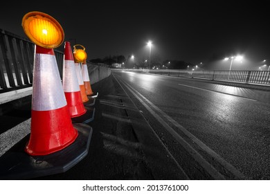 Traffic Cones At The Side Of A Road With Selective Colour, UK