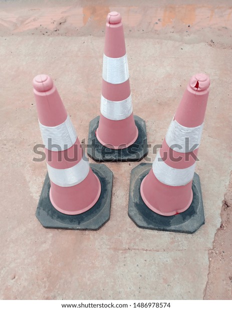 Traffic cones are used for\
dividing boundary areas or for determining traffic boundary\
lines