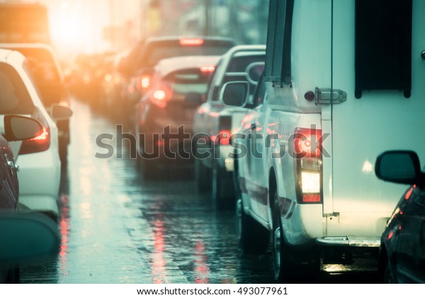 traffic congestion\
asia in dusk with rainy\
day