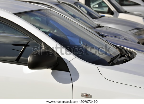 Traffic congestion: View of parked cars in crowded\
car park