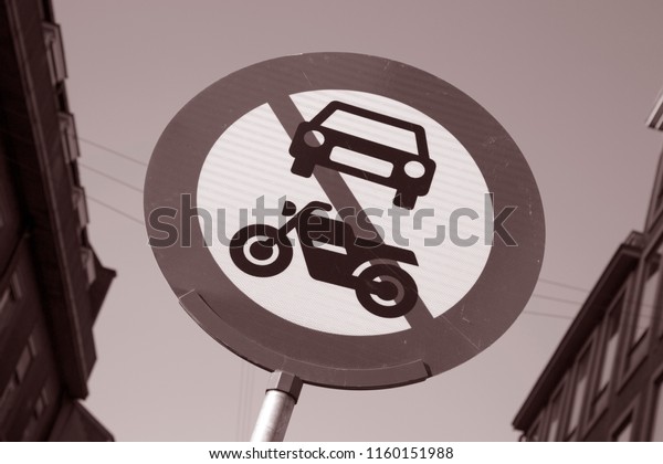 Traffic Control Sign in Urban Setting in Black and\
White Sepia Tone