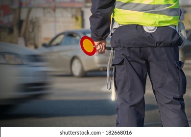 Traffic Cop Checking The Traffic.